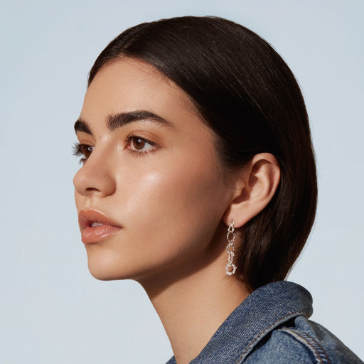 The silver drop assembly earrings by Camillette Jewelry