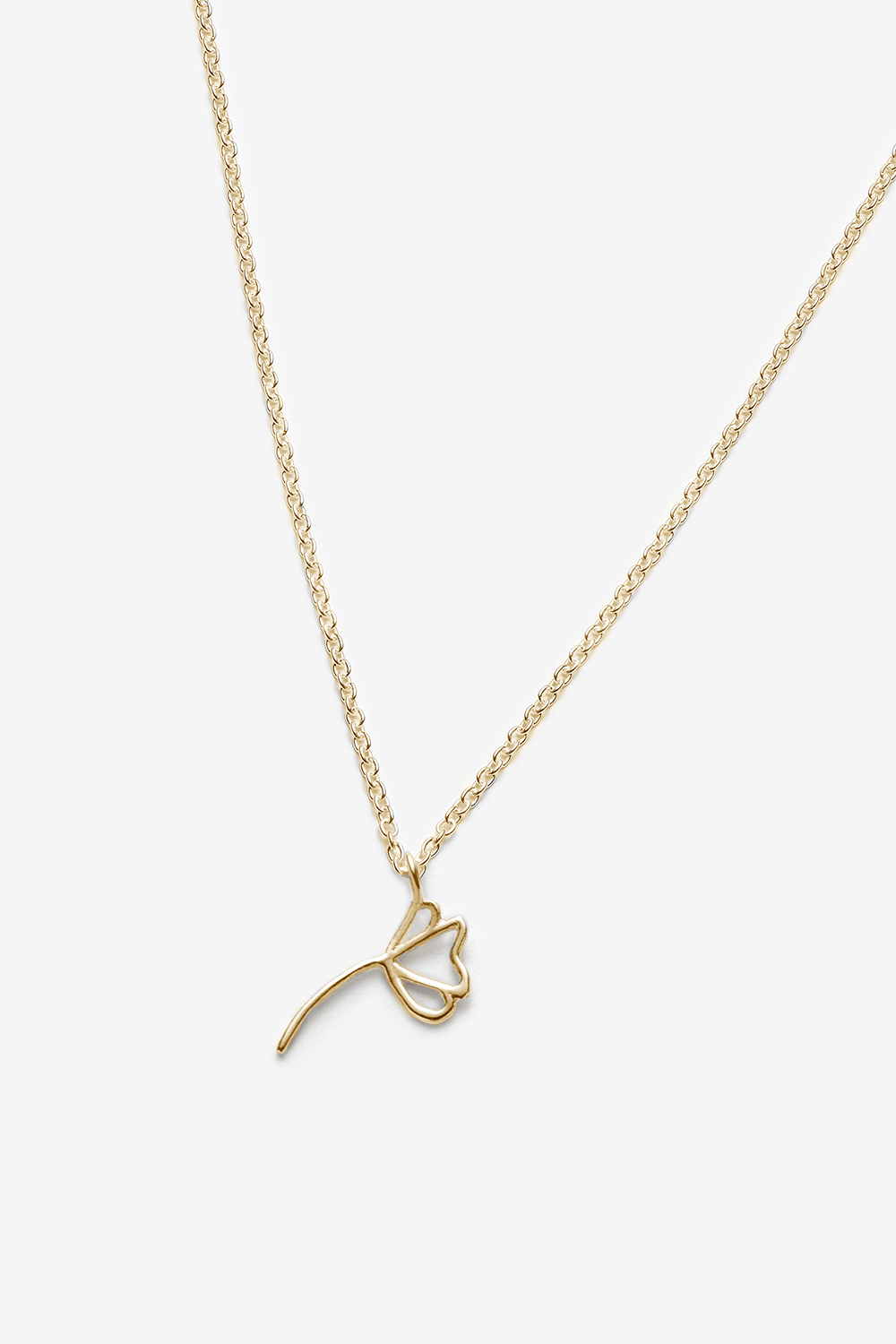 Gold necklace with a poppy-shaped pendant on a white background